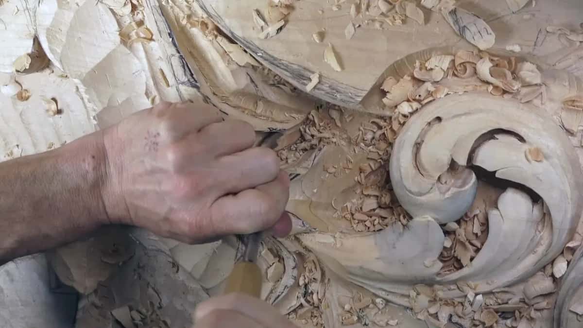 Into the hollow left of the scroll goes a gouge.