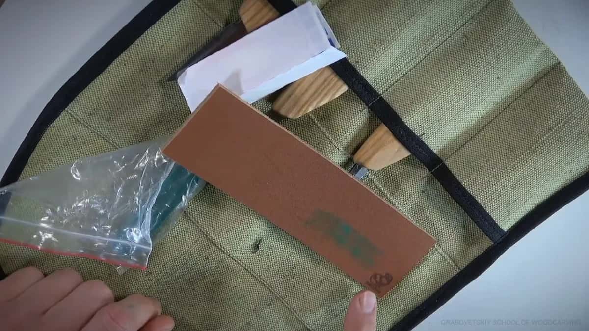 Stamped strop and green compound on the roll