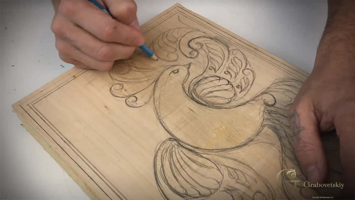 Board turned at an angle, the pencil among the crest curls over the bird's head