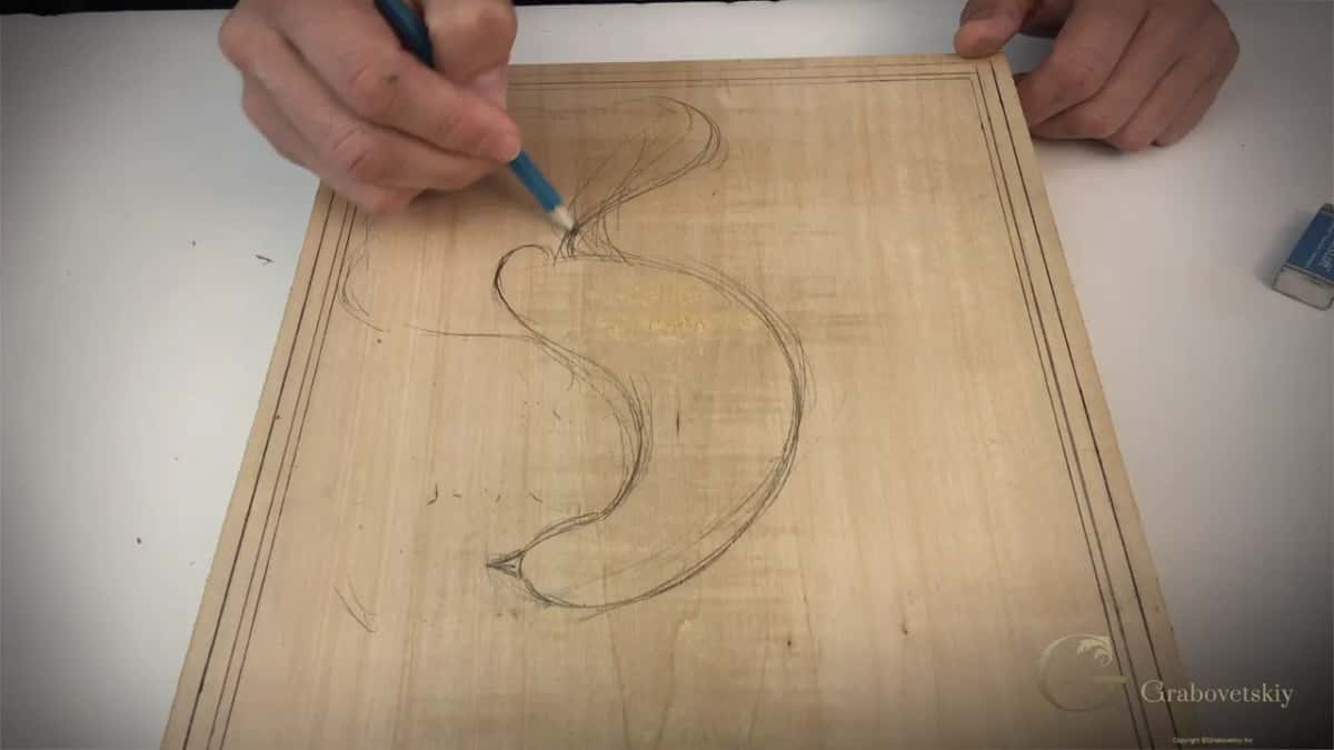 S shape, eraser nearby