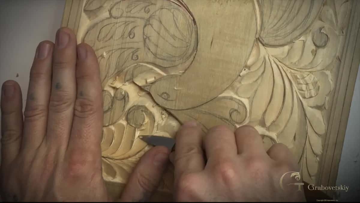 Left hand flat, blade at the bird's head