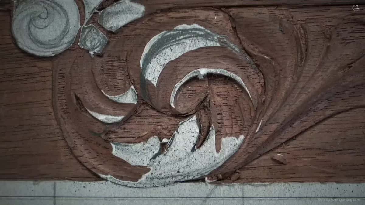 Bare walnut now showing through the middle of the scroll