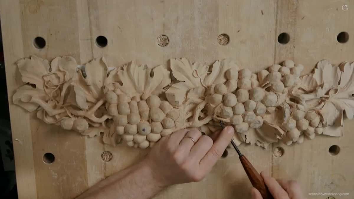 A single hand with a gouge at the lower right of the panel, and no clamp in sight
