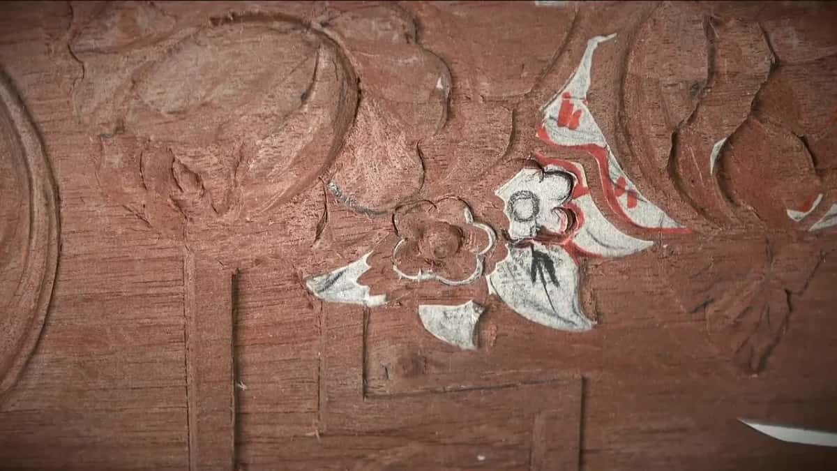 Half carved, half paper