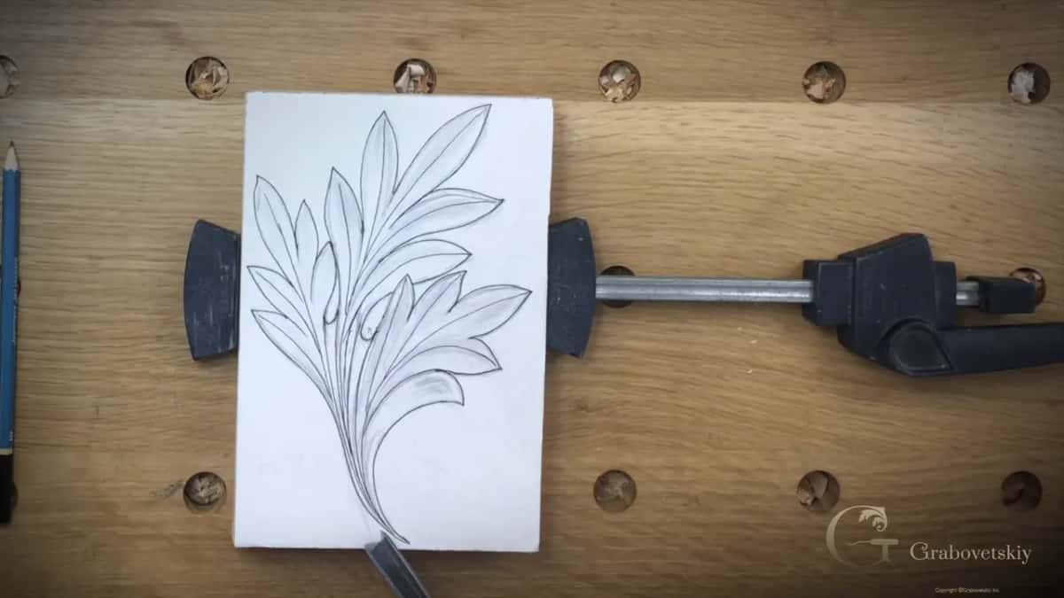 Turned upright with a gouge edge just touching the bottom of the drawing