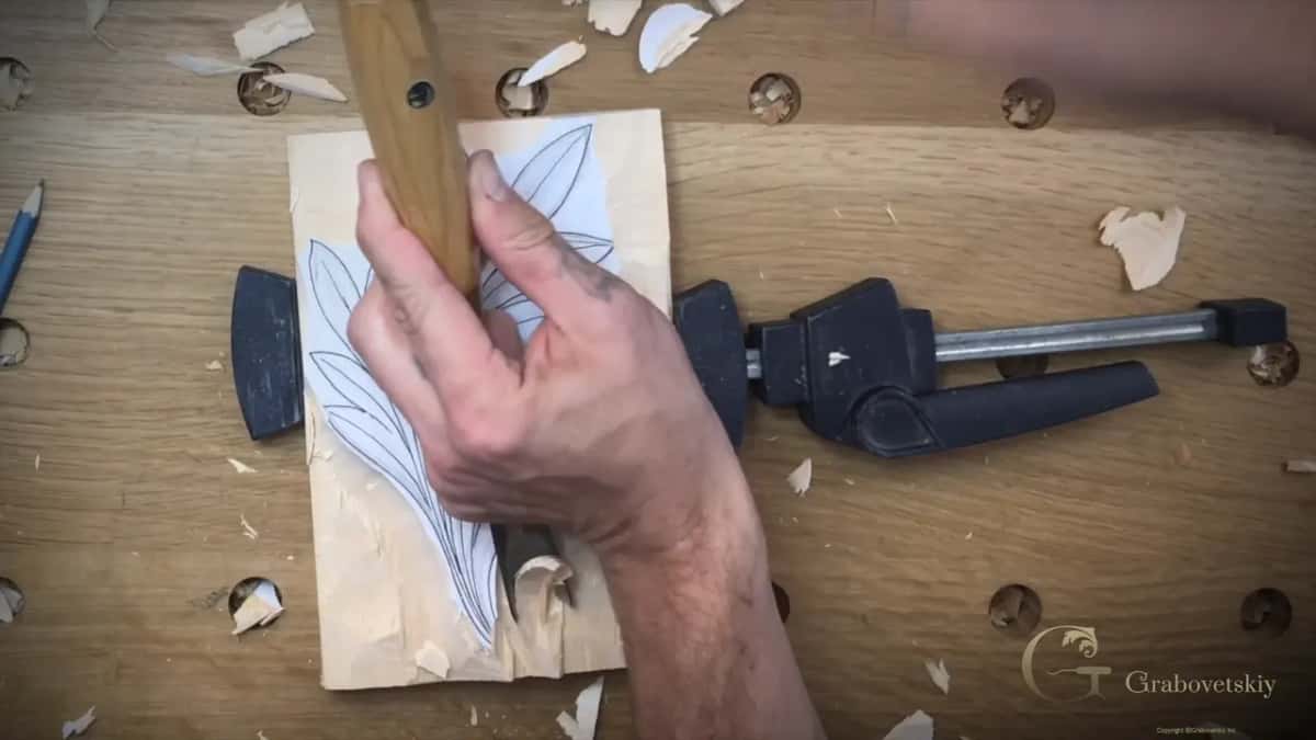 Handle in the palm, edge at the paper