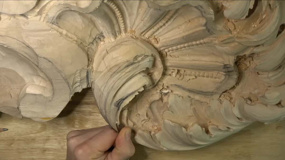 Handle held low, a gouge runs along the lower left side of the big curl.