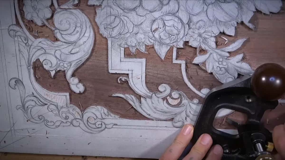 Router plane at the lower right, fingers on its base