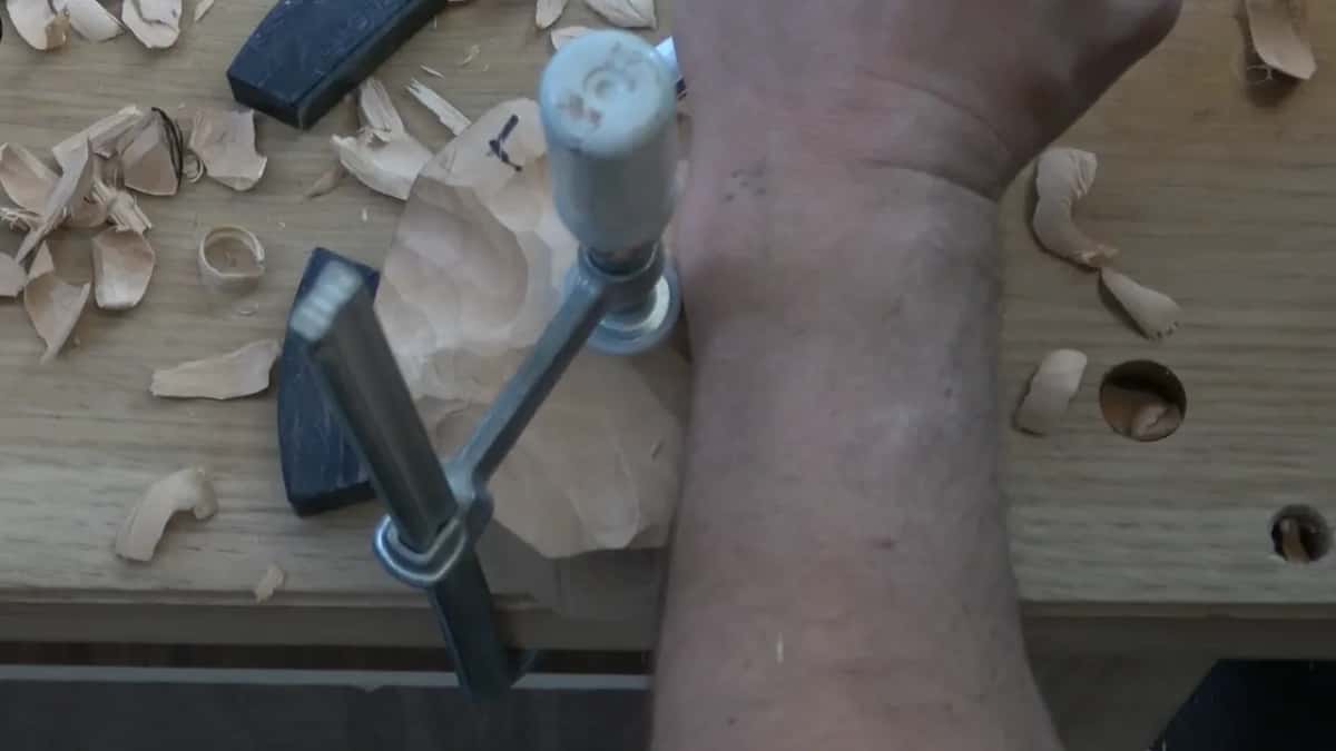 Forearm across the clamp