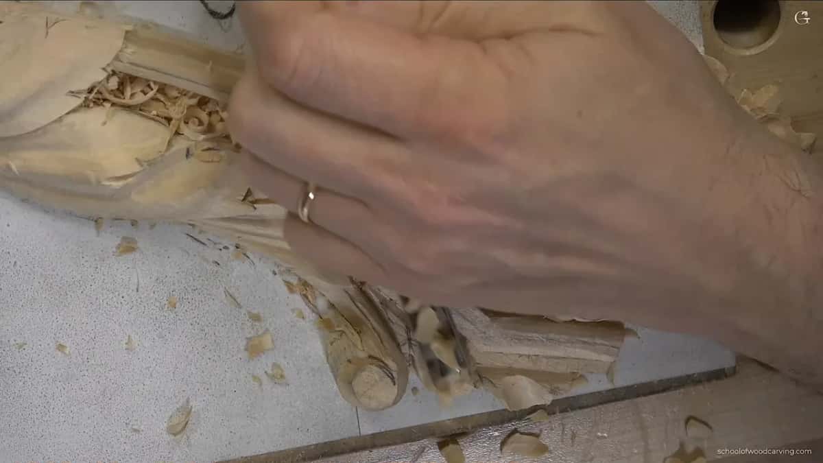 One hand spread flat over the scroll end of the panel.