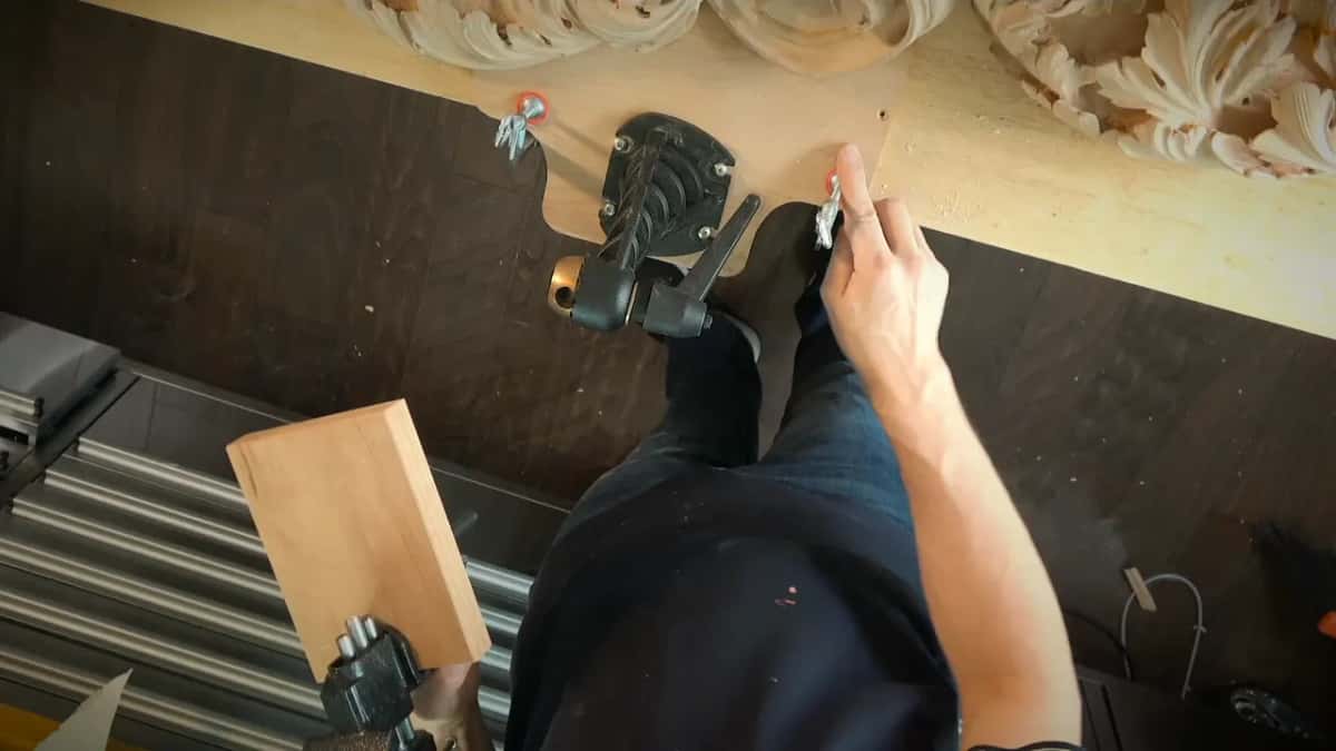 Overhead view of the plywood base, carver's vise mount and the plated block before the small piece goes in
