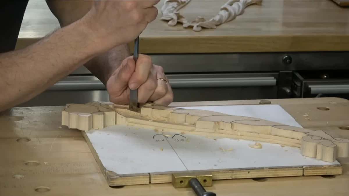 Tool held straight down along the line.