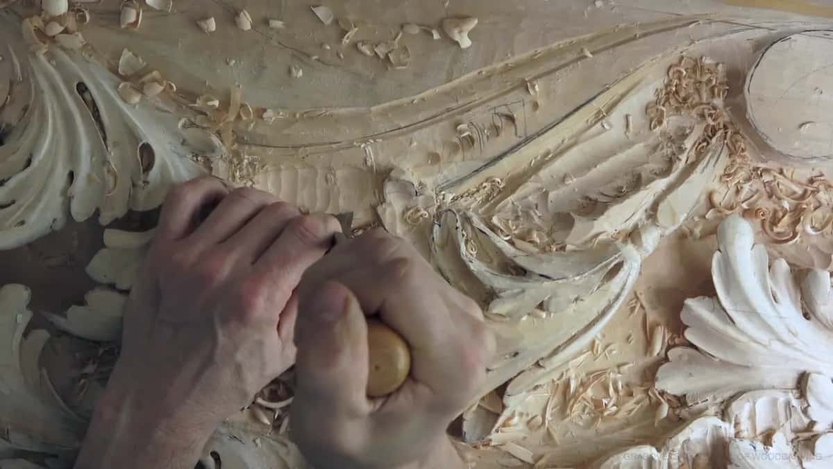 Both hands on a round handle.