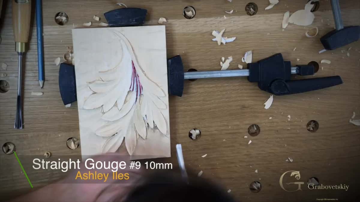 Caption card for a straight gouge, number 9, 10 mm, under the clamped block