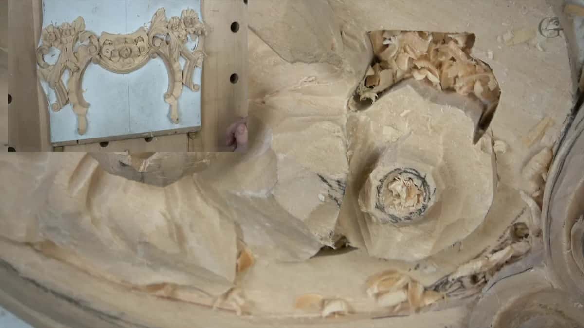 Shavings heaped in a deep hollow above the ringed center, a top view in the corner