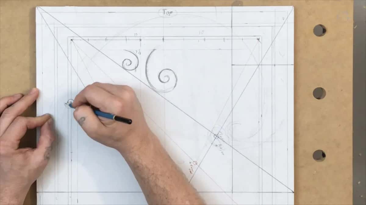 Two spirals now, a large one and a much smaller partner, drawn against the layout lines