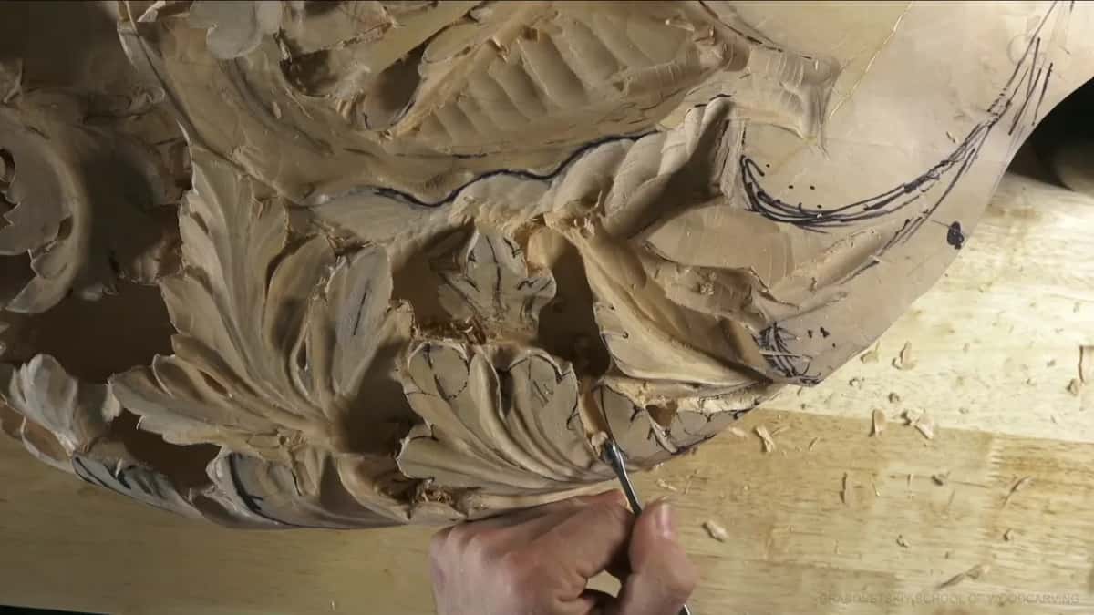 Working the leaf's lower rim.