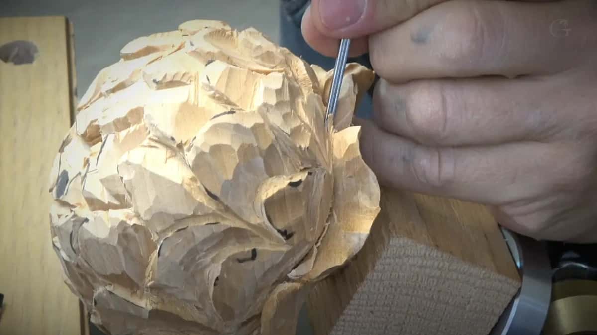 Slim tool going into a petal join, top right.