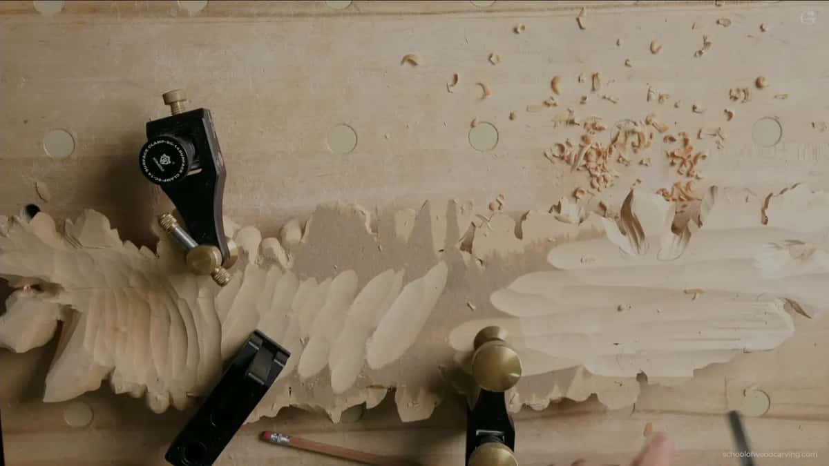 Shavings piled above the clamped onlay
