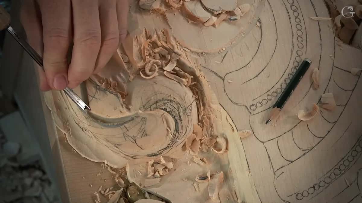 A narrow tool aimed at the spiral