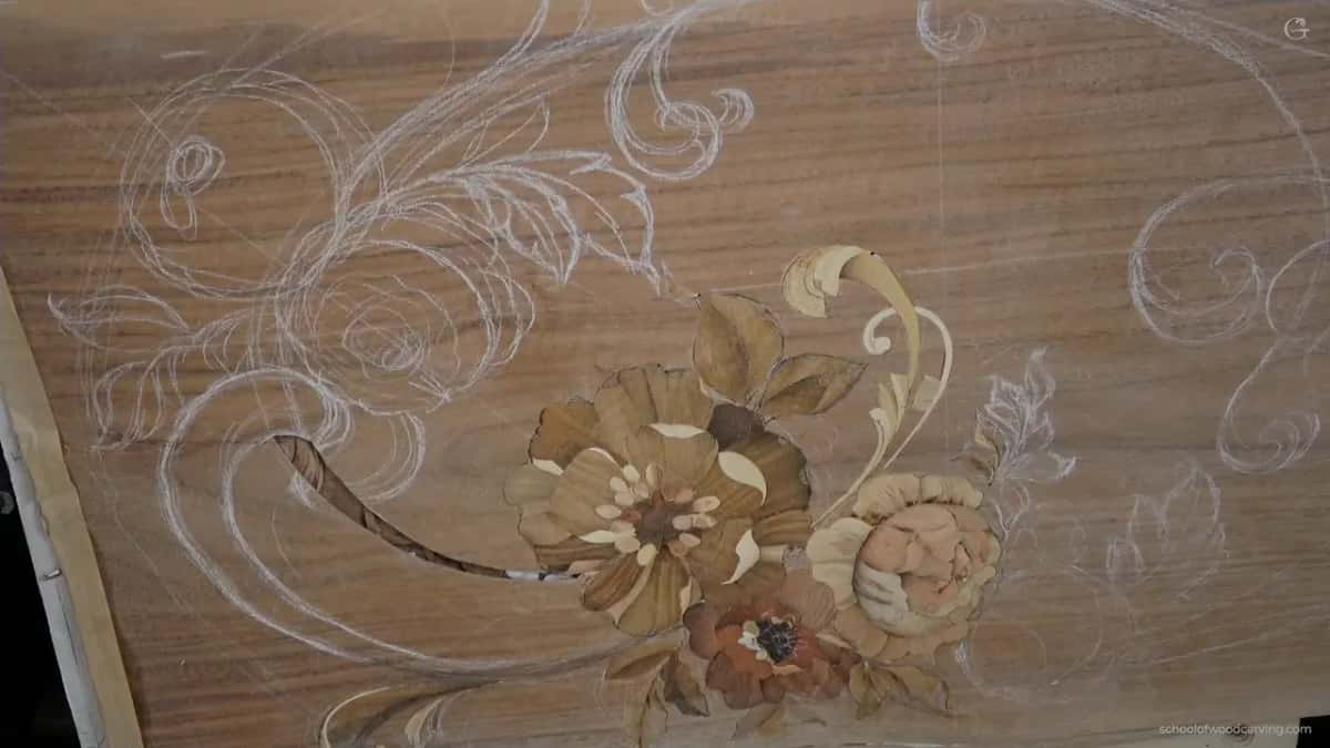 Veneer flower in several woods, the rest of the design drawn in white