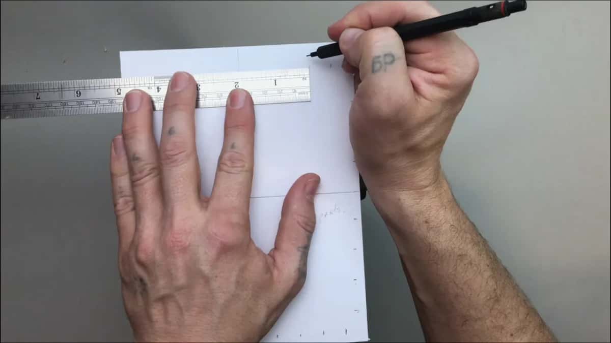 Rule along the top edge of the sheet while the pencil makes a mark near the right corner