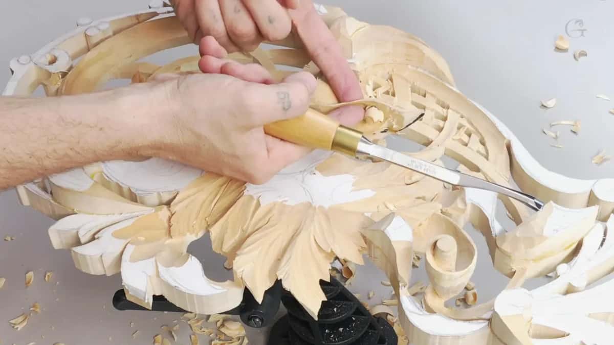 Two hands, one gouge