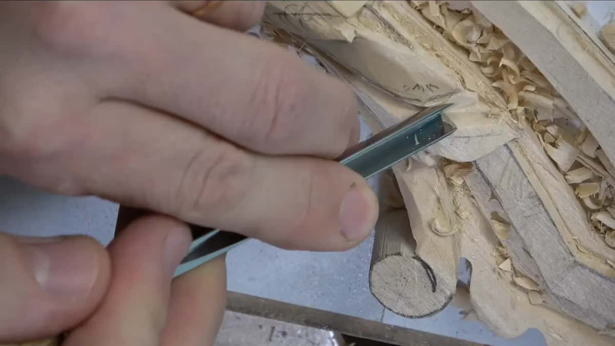 Small tool tip in the leaf right above the volute.