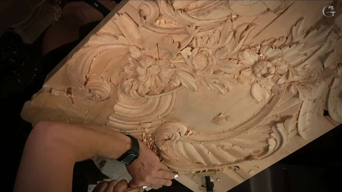 Panel turned at an angle, an arm working at its edge