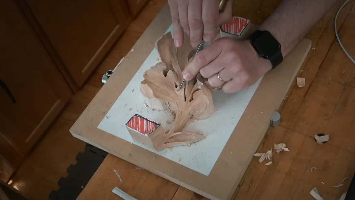 Both hands, one small gouge