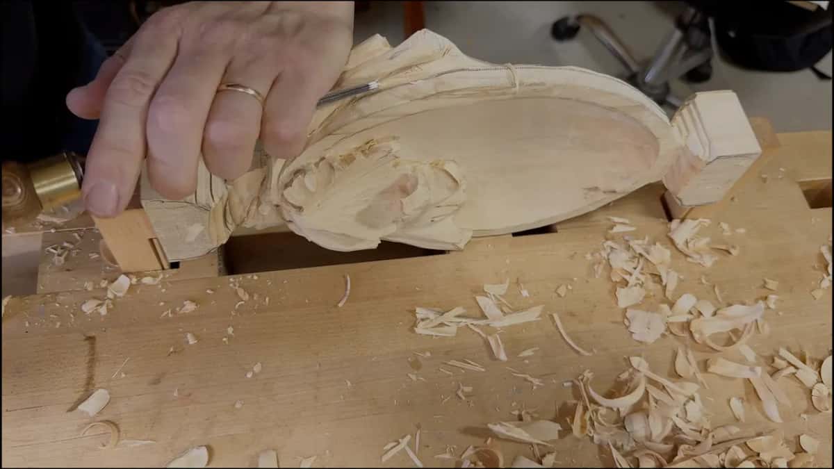Small tool under the leaf, the tray tipped up off the bench