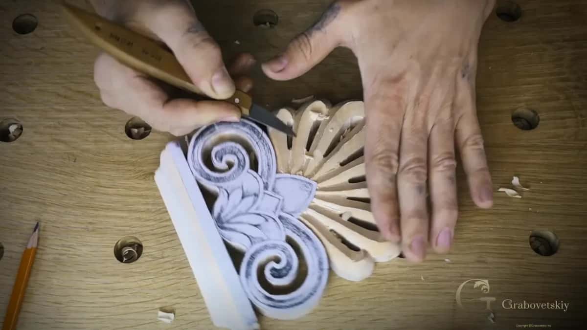 Knife beside a paper spiral