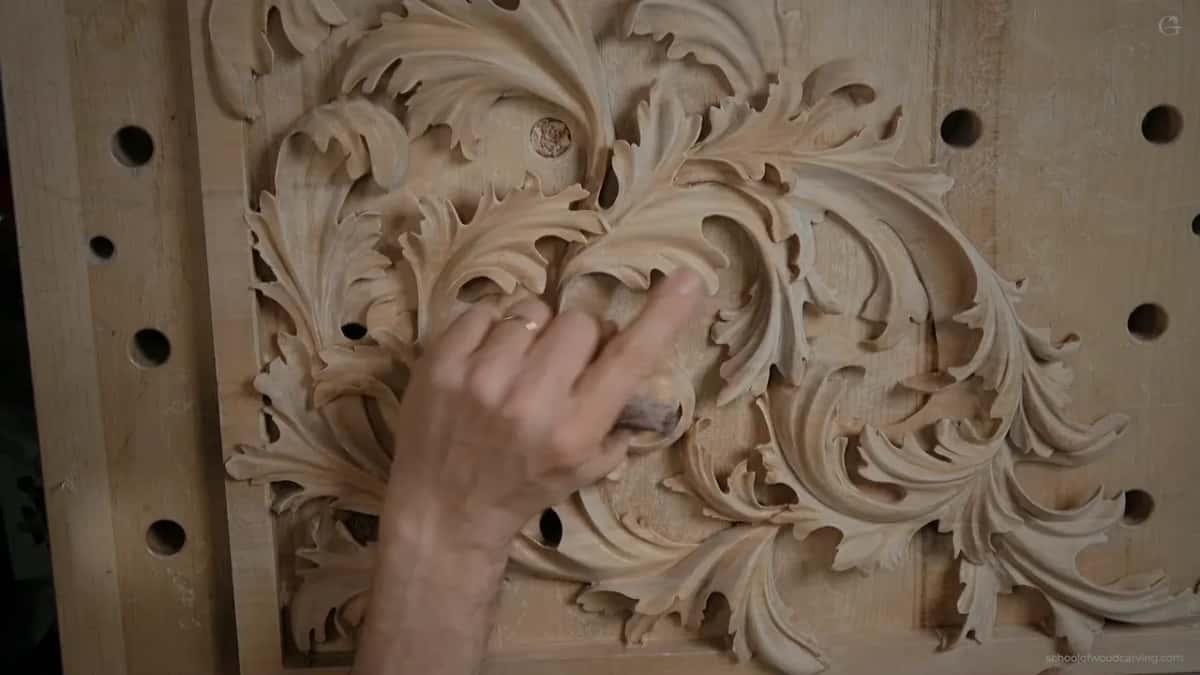 Hand-sanding one acanthus leaf.