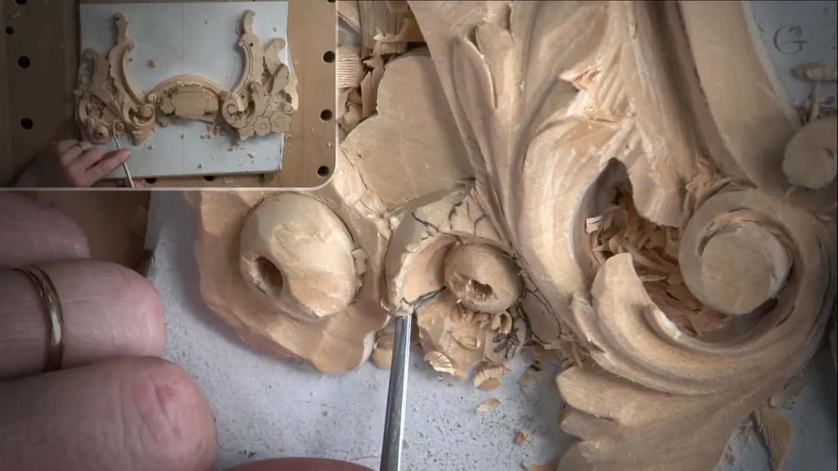 Thin steel in a groove under a petal