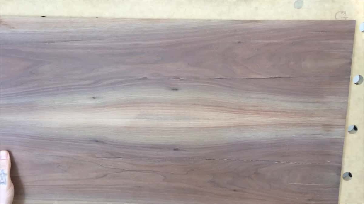 Wavy lines in flat walnut.