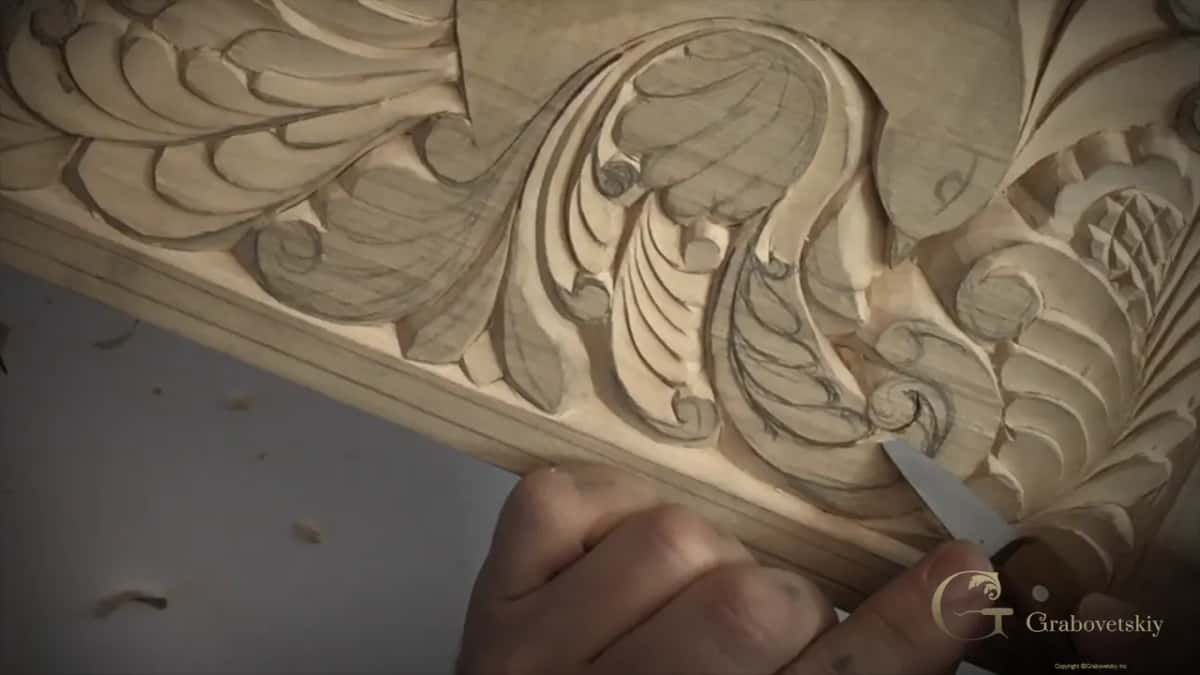 Tip of the blade at the end of a small curl, near the board's border