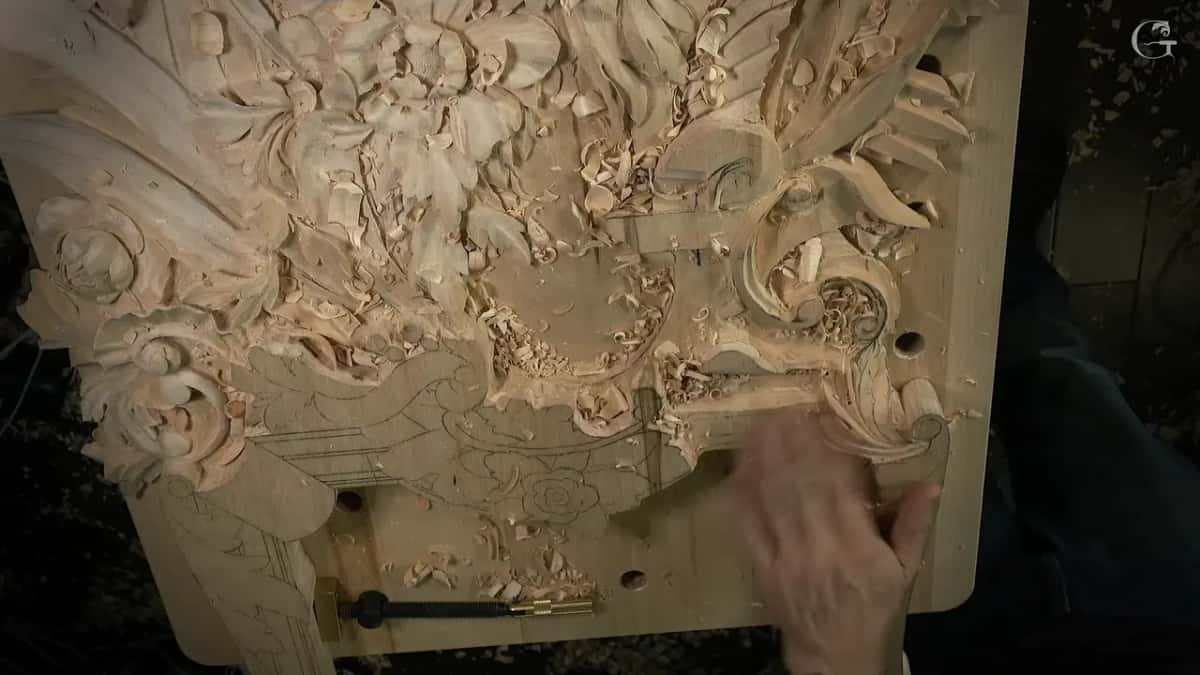 Seen from above, with one hand resting on the board